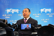 恒运能源集团董事局主席李长云接受上海电视台《第一财经频道》采访